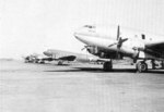 C-46 Commando and C-47 Skytrain aircraft of China National Aviation Corporation at rest in Kunming, Yunnan Province, China, date unknown