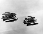 SOC-3 Seagull aircraft from cruiser Portland flying in a formation of four, circa 1944, photo 1 of 2