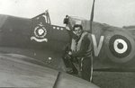 Canadian pilot James Henry Whalen posing with his Spitfire fighter, RAF Tangmere, West Sussex, England, United Kingdom, 1941