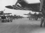 UK Royal Air Force Stirling bombers, acting as glider tugs, lining at the runway at Tarrant Rushton, England, United Kingdom, May-Jun 1944; note invasion strips