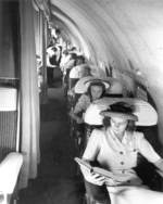Passengers aboard a Boeing 307 aircraft operated by Pan American World Airways, between 1940 and 1947