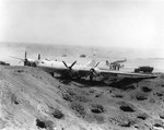 B-29 crash-landed on Motoyama Airfield, Iwo Jima, Bonin Islands, after fighters disabled two engines on a bombing run over Osaka, 10 Mar 1945. Photo 1 of 2.