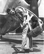 WASP pilot Deanie (Bishop) Parrish in front of her P-47 Thunderbolt aircraft, circa early 1940s
