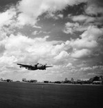 PV-1 Ventura aircraft of US Navy patrol bomber squadron VPB-125 taking off from Natal, Brazil, 25 Apr 1945; note PB4Y-1 Liberator bombers in background