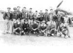 Chinese and American pilots of the Chinese-American Composite Wing (Provisional) with a P-40N Warhawk fighter, China, 1943-1945