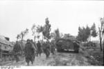 German troops on a road near Nettuno, Italy, Mar 1944; note Ferdinand/Elefant tank destroyer