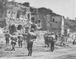 Troops of US 3rd Division entering Valmontone, Italy, circa May 1944