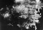 Fires raging in Toyama, Japan during an American air raid, 1 Aug 1945
