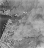 Osaka, Japan burning during an American raid, 1 Jun 1945, photo 1 of 2