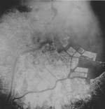 Aerial view of Tokyo, Japan after the 9 Mar 1945 raid, circa 10-15 Mar 1945; photo 2 of 3