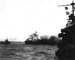 Explosion aboard USS Lexington, 8 May 1942, photo 1 of 2; note USS Hammann nearby; seen from cruiser USS Minneapolis