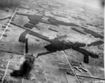Aerial photograph taken by one of the Doolittle Raiders during the attack, 18 Apr 1942, photo 1 of 3