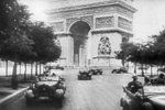 German staff cars parading in Paris, France in front of the Arc de Triomphe, 1940; still from Frank Capra