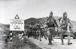 Troops of 228th Regiment of Japanese 38th Division marching into Hong Kong, mid-Dec 1941
