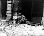 Browning M1919 machine gun crew of 2nd Battalion, US 26th Infantry in the streets of Aachen, Germany, 15 Oct 1944