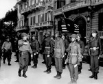 Major General Edward Almond of the US 92nd Infantry Division inspecting his African-American troops, Italy, circa Mar 1945