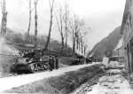 Japanese-American troops of US 442nd Regimental Combat Team in Seravezza, Italy, 1944. Note the M5 Stuart tanks.