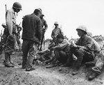American Marines fed Japanese POWs K rations, Iwo Jima, Feb 1945