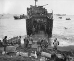 US Marines unloading supplies from a LSM, Iwo Jima, Japan, 22 Feb 1945