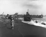 LSM-264 unloading on Red Beach One, Iwo Jima, Japan, 2 Mar 1945