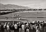 Japanese-American internees of the Manzanar War Relocation Camp playing a game of baseball, California, United States, circa 1943