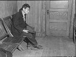 Japanese-American Toshi Mizoguchi waiting at a Wartime Civil Control Administration station to register for evacuation, Byron, California, United States, 28 Apr 1942