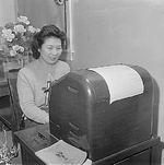 A female Japanese-American stenographer at the Jerome Relocation Center, Arkansas, United States, 11 Mar 1943
