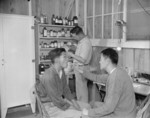 Japanese-Americans Dr. K. H. Taria and pharmacist Tom Arase at work, Jerome War Relocation Center, Arkansas, United States, 17 Nov 1942