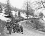 Captured German officers and men marching under loose American supervision, Austria, 1945