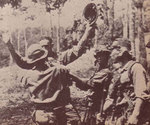 Japanese troops disarming captured British soldier, Malaya, circa Dec 1941-Feb 1942