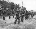 Men of 2nd Regiment, 2nd Division, US Marine Corps coming off the front lines after 20 days of combat, Saipan, Mariana Islands, 5 Jul 1944