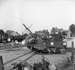 A heavily loaded Universal carrier during the advance of the British 3rd Division, the Netherlands, 19 Sep 1944