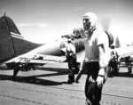 Enterprise VB-6 SBD, with pilot Ensign George Goldsmith and Radioman 1st Class James Patterson, Jr. still onboard, on the flight deck of Yorktown due to fuel exhaustion, 4 Jun 1942, photo 1 of 2