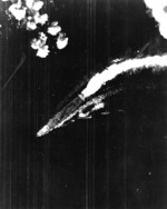 Hiryu maneuvering to avoid three sticks of bombs dropped by B-17 bombers, off Midway Atoll, shortly after 0800 hours, 4 Jun 1942, photo 2 of 2