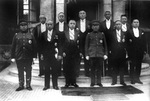 Manchukuo politicians. Front: Yu Zhishan, Xie Jieshi, Xi Qia, Zhang Jinghui, Zang Shiyi, Lu Ronghuan, Ding Jianxiu. Back: Yuan Jinkai, Li Shaogeng, Ruan Zhenduo, Zhang Yanqing, 1930s, photo 1 of 2