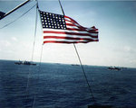 An American flag flew on a convoy ship while underway, location unknown, circa 1943-1945