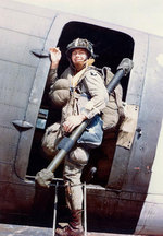 US 101st Airborne Division paratrooper Corporal Louis E. Laird boarded a C-47 transport during dress rehersals for the Normandy invasion, spring 1944
