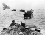 Troops of the Canadian Royal Winnipeg Rifles regiment approaching Juno Beach, Normandy, France aboard LCA landing craft, 6 Jun 1944