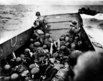 American troops en route to the invasion beach aboard LCVP landing craft, Normandy, France, 6 Jun 1944