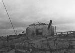 Damaged German defensive fortification at Bernières-sur-Mer, France, Jun 1944
