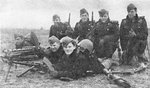 Danish machine gun team gathered for a photo hours before engaging with German invaders, Bredevad, Denmark, 9 Apr 1940; two of the men died later that day; note Madsen light machine gun