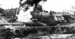 American flamethrower tank attacking a Japanese-held cave, Okinawa, Japan, circa Apr-Jun 1945