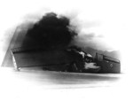 PBY Catalina aircraft aflame at Naval Air Station Kaneohe, Oahu, US Territory of Hawaii, 7 Dec 1941