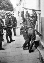 German troops forcing entry into a building, Western Poland, Sep 1939