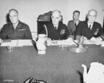 Brigadier General A. J. McFarland, Admiral William Leahy, and Admiral Ernest King at a meeting during the Potsdam Conference, Germay, 21 Jul 1945