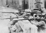 Soldiers of the Chinese 19th Route Army at a roadblock in the Zhabei District of Shanghai, China, Feb 1932