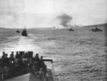 US Army LCI landing craft moving toward Cape Gloucester as smoke screened Target Hill and the beaches, New Britain, Dec 1943