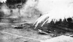 Phosphorus bombs exploding on Japanese airfields at Rabaul, New Britain, Nov 1943
