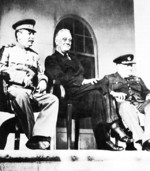 Stalin, Roosevelt, and Churchill on the portico of the Russian Embassy during the Tehran Conference, 29 Nov 1943, photo 2 of 2