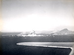 Japanese ammunition ships in Truk Harbor destroyed by dive bombers of USS Intrepid, Caroline Islands, 17 Feb 1944, photo 2 of 2; the dive bomber that caused this destruction was also lost in the blast